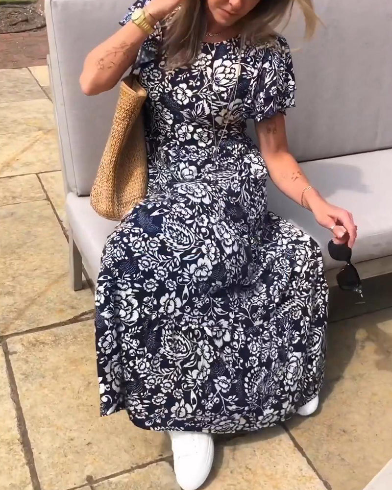 Van Dann | Lange jurk met korte mouwen en bloemenprint