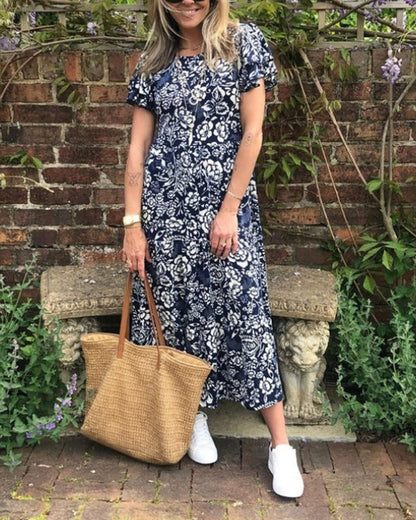 Van Dann | Lange jurk met korte mouwen en bloemenprint