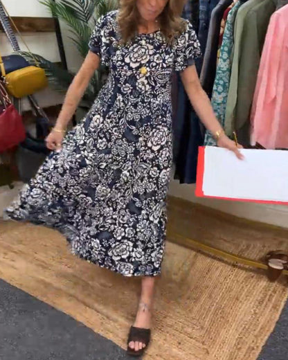 Van Dann | Lange jurk met korte mouwen en bloemenprint