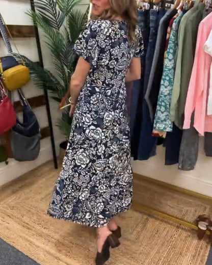 Van Dann | Lange jurk met korte mouwen en bloemenprint