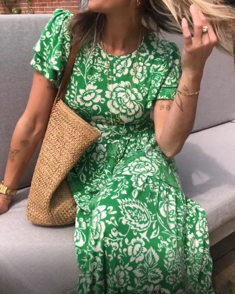 Van Dann | Lange jurk met korte mouwen en bloemenprint